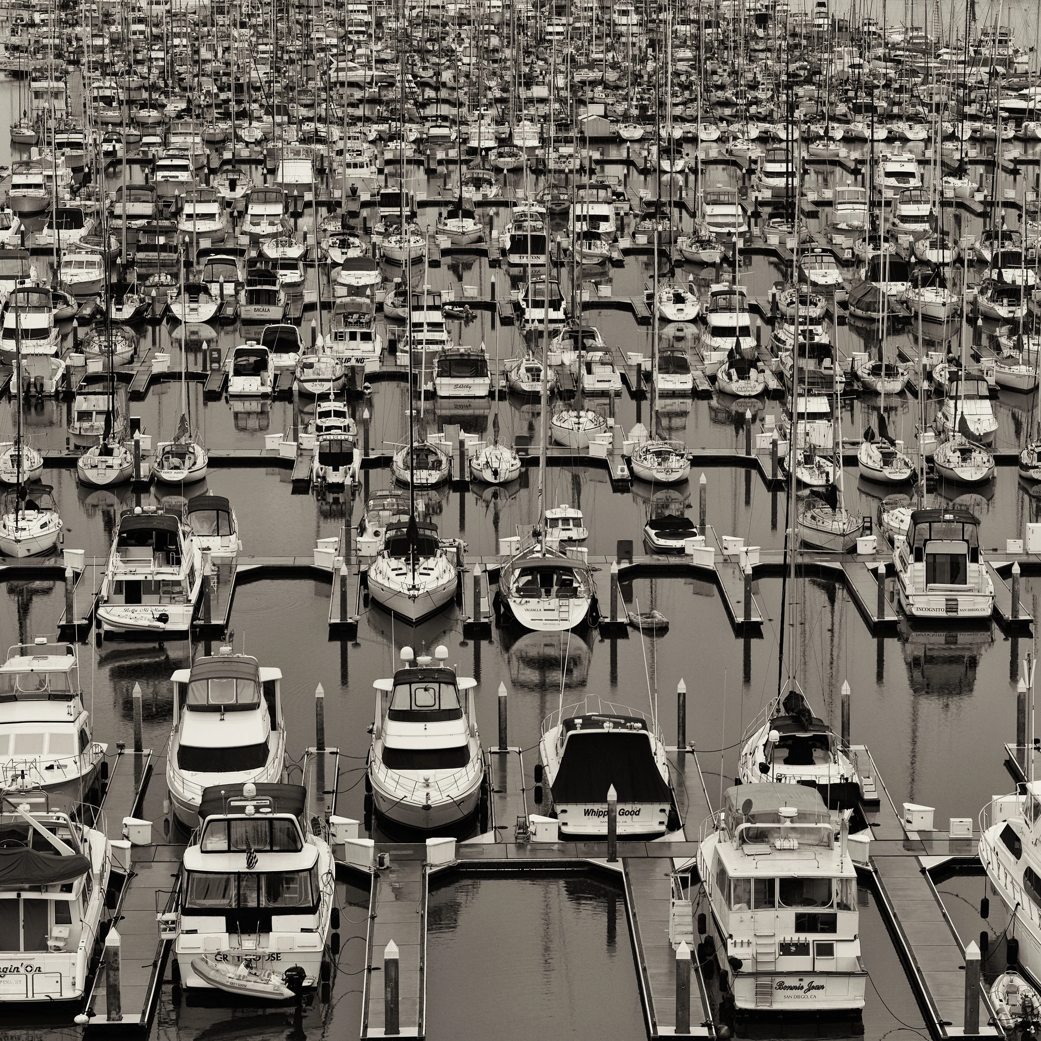 A large marina, densely packed with mostly pleasure boats, off into the distance.