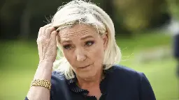 Marine Le Pen to launch lawsuit after father filmed with neo-Nazi band