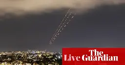 Israel reports minor damage to military base after ‘limited number’ of Iran missiles fall on its territory – live