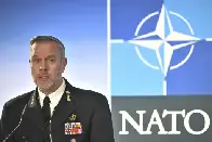 NATO military chief says troops would be on ground if not for Russian nukes