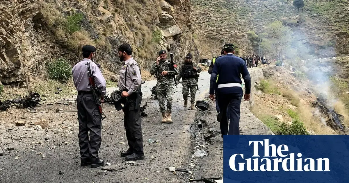 Six killed after suicide bomber rams convoy of Chinese engineers in Pakistan