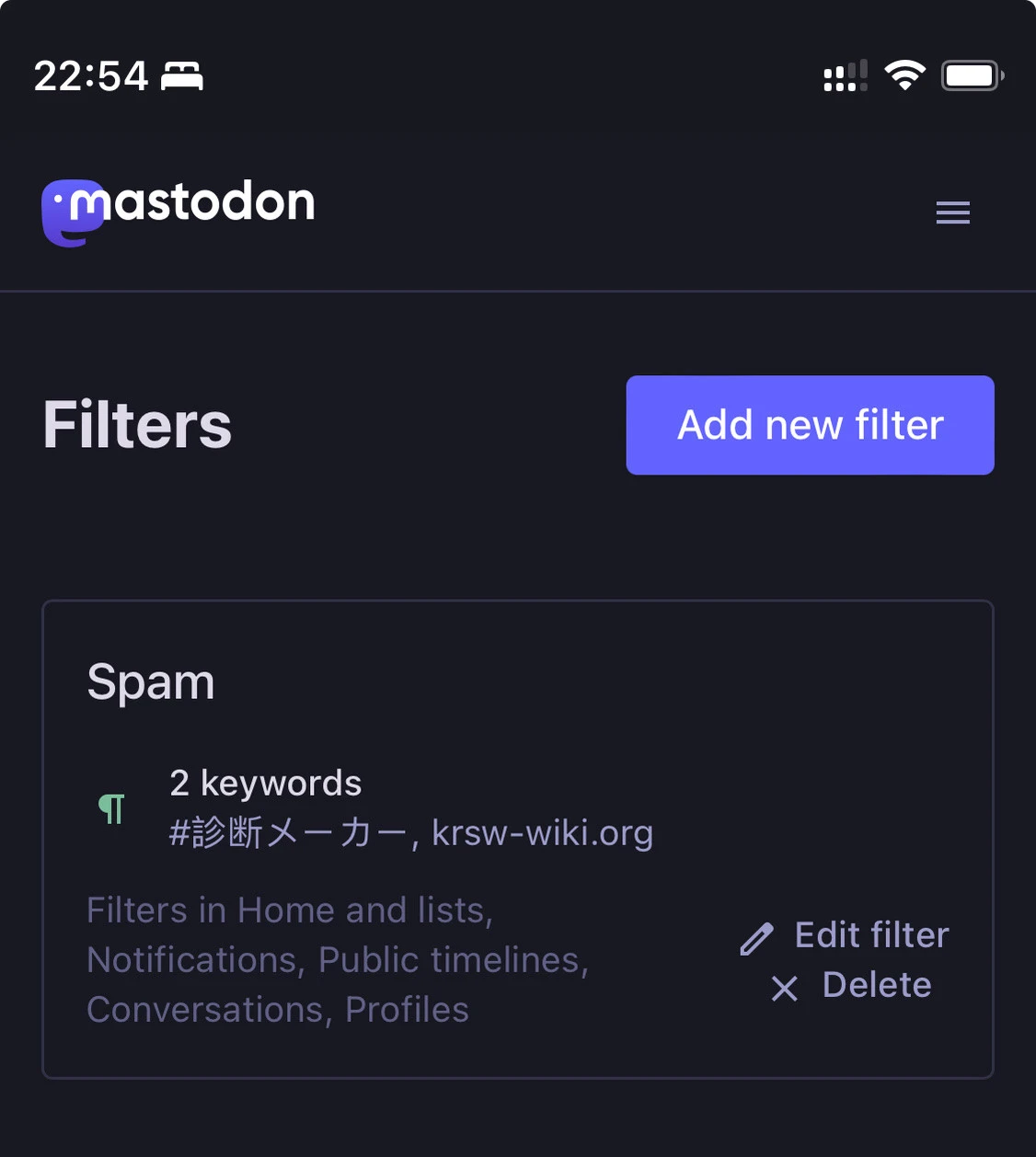 Screenshot of the Mastodon admin interface on mobile, showing the Filters section with a filter set called Spam with krsw-wiki.org listed as one of the two keywords.