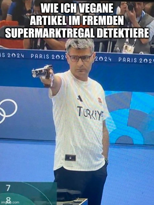 casual turkish Olympic shooter meme: "wie ich vegane Artikel im fremden Supermarktregal detektiere"